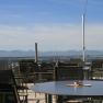 Terrace Gasthof Alpenblick, © Karl Hintersteiner Terrace with tables and chairs, Alpine panorama in the background.