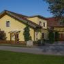 House view, © Privatzimmer Leeb Yellow detached house with red roof and garden.