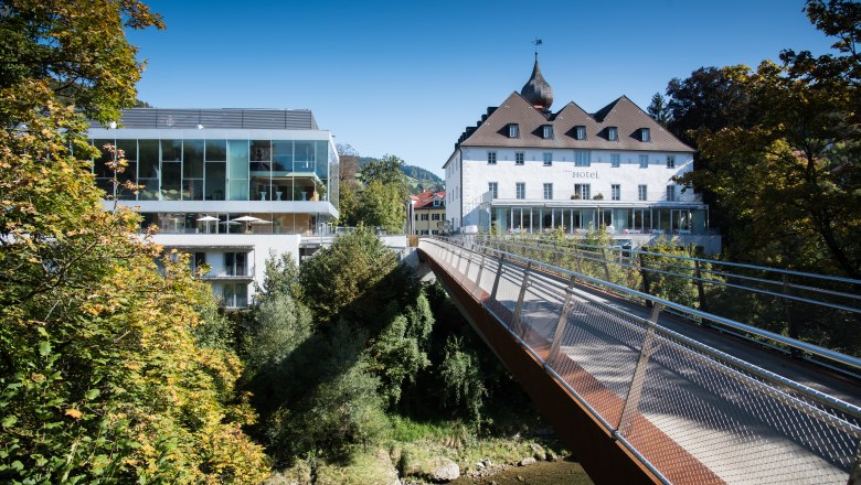 The castle on the Iron Road, © dphoto.at Modern and historic building with bridge in green surroundings.