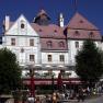 Historic building with hotel and caf&eacute; on the main square.