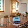 Seminar table with laptop, &copy; Thomas Vostandlechner